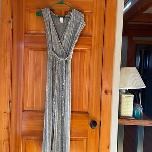 Black and white striped Capri length jumpsuit.